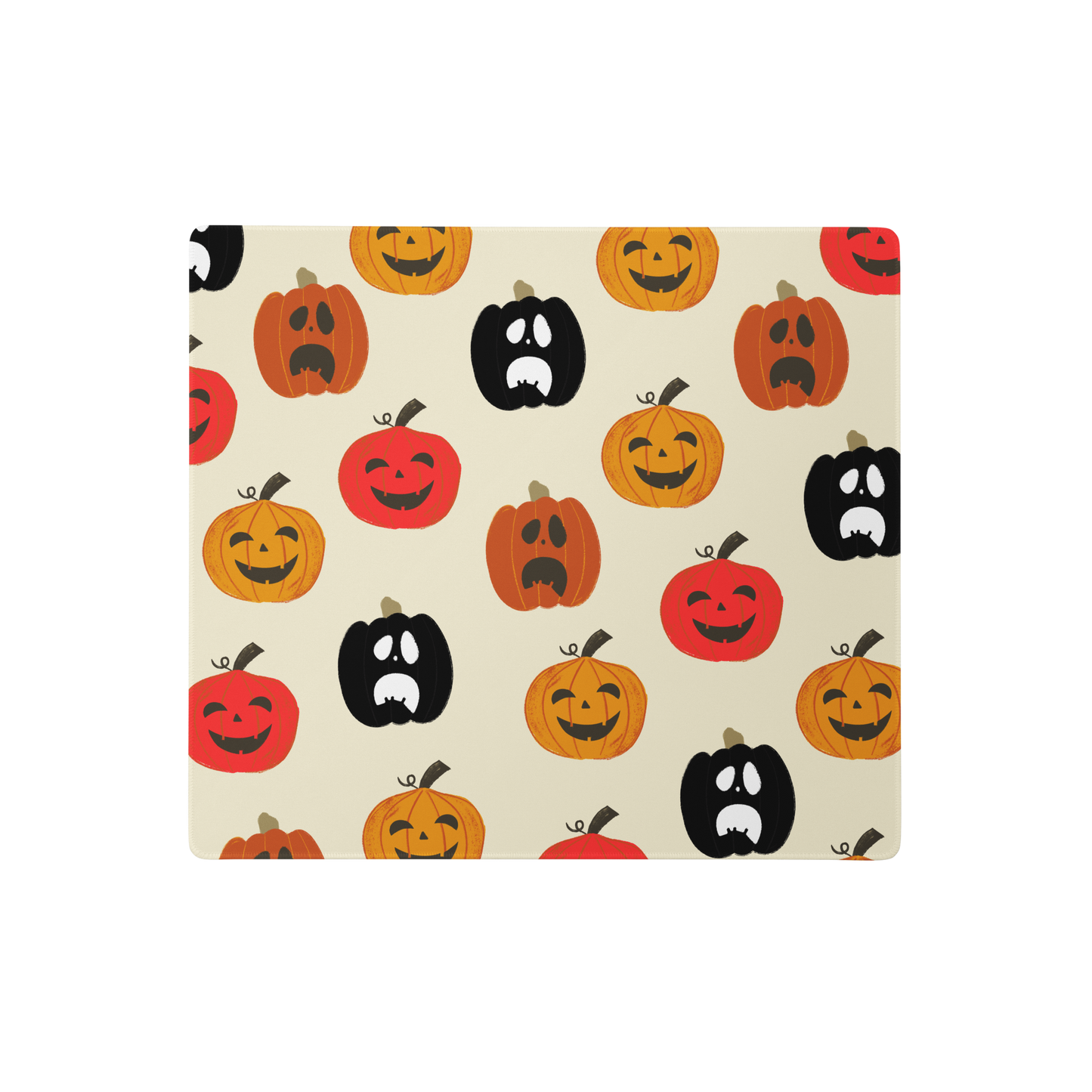 Gaming mouse pad with spooky pumpkin designs; features rounded edges and a sleek, modern look. Made with a 100% polyester top for smooth and accurate movements, adding a haunting touch to any gaming setup.